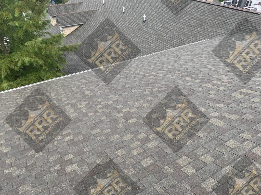 Aerial close-up of a multi-plane shingle roof