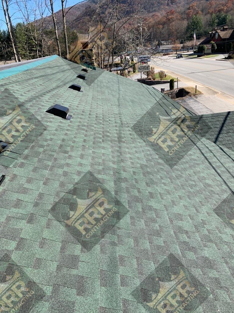 Aerial view of a completed roof on a mountain residence